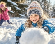 Girls throwing snowballs.