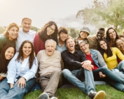 People in multigeneration laughing.